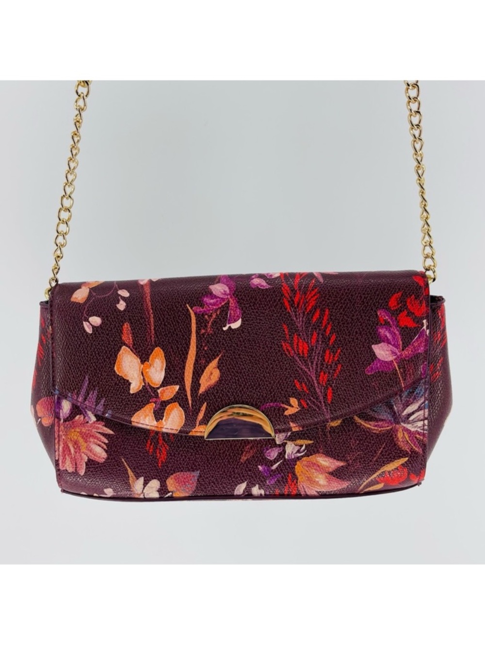 A New Day Convertible Crossbody/Clutch in Burgundy Floral/Gold Chain Details